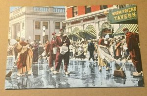VINTAGE UNUSED LINEN POSTCARD SCRUBBING UP FOR TULIP TIME HOLLAND  MICH.
