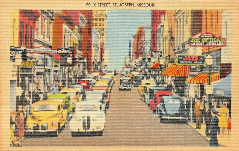 ST JOSEPH MISSOURI FELIX STREET-AUTOS-STOREFRONTS-SIGNS~1930s POSTCARD