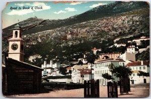 VINTAGE POSTCARD ROAD TO DOCK AND CLOCK AT GIBRALTAR c. 1910 [small corner chip]