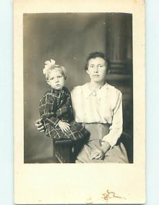 Pre-1930 rppc CUTE GIRL WITH BOW IN HAIR ON MOM'S LAP r6162