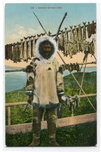 Eskimo Inuit Man Drying Fish 1910c postcard