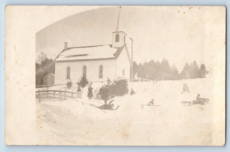 Children Sledding Postcard RPPC Photo Church Winter Scene c1910's Antique