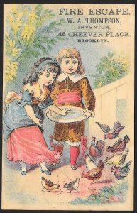 WA Thompson Fire Escape Fancy Dressed Boy & Girl Feeding Birds