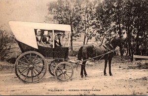 Netherlands Middelburg Locals In Trdaitional Costume Riding In Horse Drawn Wagon