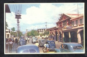 KINGSTON JAMAICA DOWNTOWN STREET SCENE OLD CARS SCOOTER VINTAGE POSTCARD