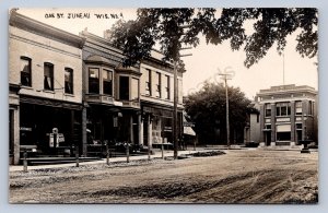 J90/ Juneau Wisconsin RPPC Postcard c1910 Oak Street Stores  249