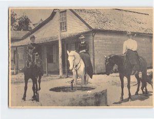 Postcard Side-saddling gals pause to water their horses, Fort Myers, Florida