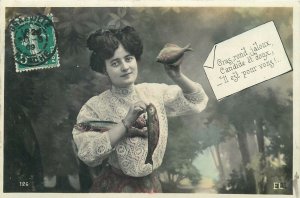 Greetings Postcard vintage outfit fancy coiffure lady holding fish floral design