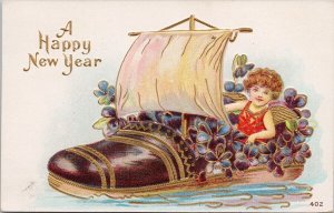 Happy New Year Child Girl In Shoe Sail Boat Sailing Embossed A & S Postcard H58