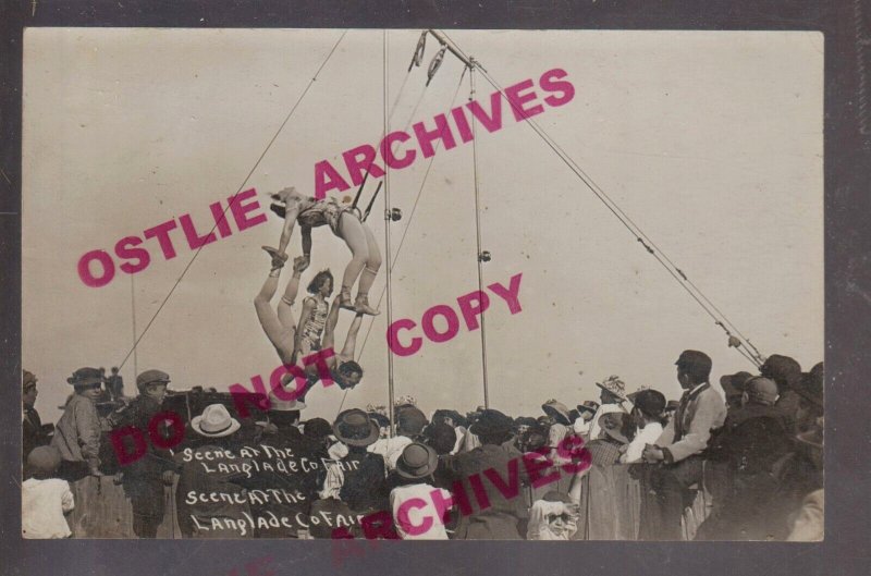 Antigo WISCONSIN RPPC 1910 ACROBATS Circus Carnival COUNTY FAIR Swing CROWD WI