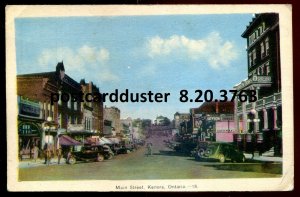 3763 - KENORA Ontario Postcard 1930s Main Street. Stores by PECO