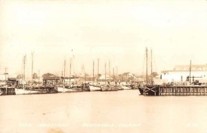 Pensacola Florida view of docked boats Fish Industries real photo pc BB3365