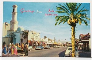 Indio California Greetings Shops Old Cars Palms Camel Postcard I3