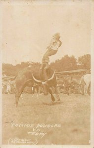 RODEO COWBOY TOMMIE DOUGLAS versus TEDDY-LONGHORN BULL~1910s REAL PHOTO POSTCARD
