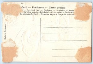 c1910s Christmas Children With Doll Snowman Cigar Winter Scene Embossed Postcard