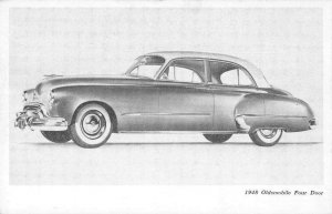 1948 Oldsmobile Four Door Automobile Ad Vintage Postcard JI657309