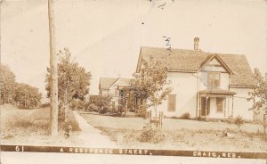 J74/ Craig Nebraska RPPC Postcard c1910 Residence Street Homes  415