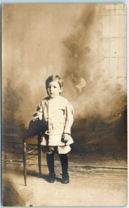 M-32935 Little Boy Posing Beside The Chair Vintage Picture