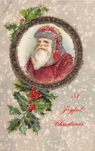 J71/ Santa Claus Christmas Postcard c1910 Glitter Holly Wreath 245