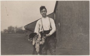 Cruel French Man in Braces Forcing Dog To Wave Antique Postcard