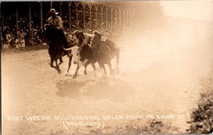 RPPC Cowboy Bert Weems Bulldogging Belle Fourche SD Vintage Postcard R59