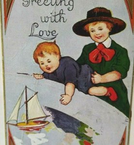 Christmas Postcard Whitney Victorian Dressed Children Reaching For Sailboat Ship