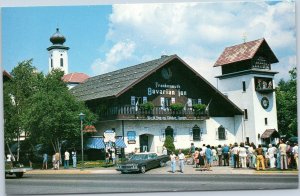 postcard MI - Frankenmuth Bavarian Inn -- crowd outside watching Town Clock