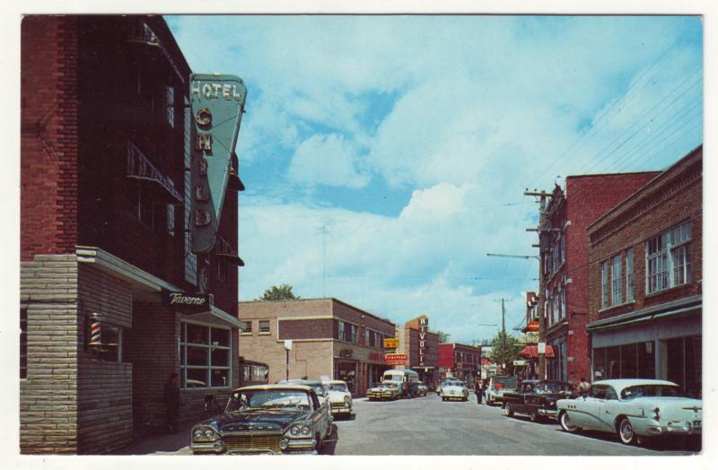 P790 vintage many cars signs etc la rue child coaticook quebec canada