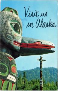 Visit Us in Alaska - Carved Totem pole at Saxman Indian Village near Ketchikan