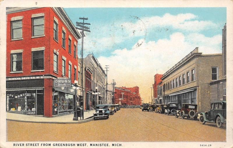 Manistee Michigan~RIver Street @ Greenbush West~Merten's Drug Co~1929 PC 