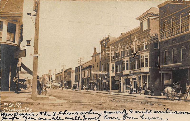 Skowhegan ME Bucknam's Storefronts Horse & Wagons Postcard