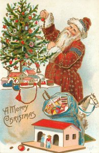 Gilded Embossed Christmas Santa Claus Postcard Santa Decorates Tree