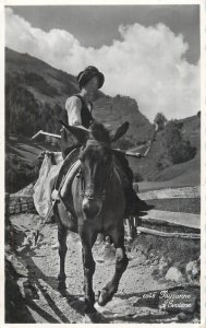 Horse mounted peasant woman from Evolene, Switzerland Valais 1948