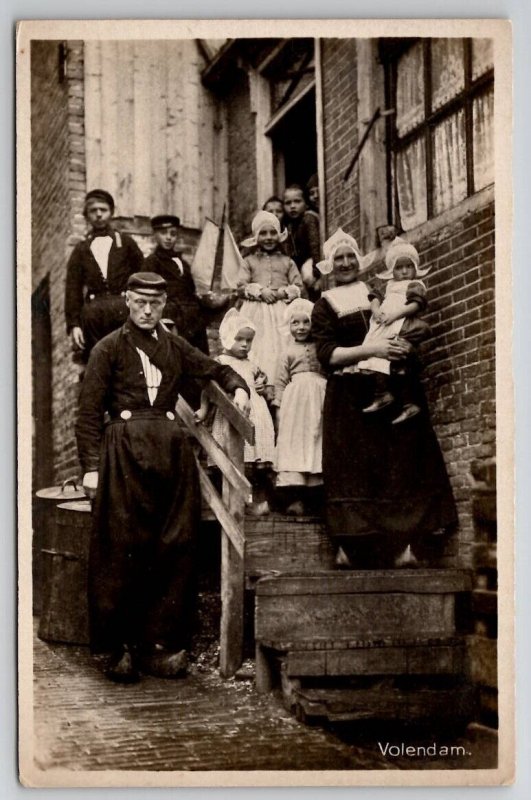 RPPC Netherlands Volendam Family Traditional Costume Boy Sailboat Postcard K27