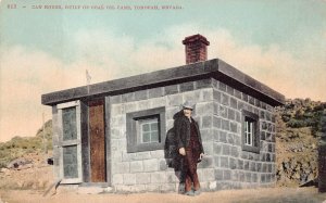 CAN HOUSE BUILT OF COAL OIL CANS TONOPAH NEVADA POSTCARD (c. 1910)