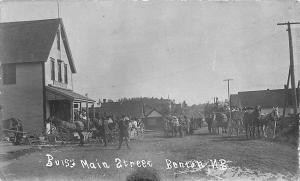 Benton N.B. D. W. Olts Store Busy Street View Horse & Wagons RPPC Postcard