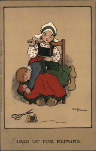 Ethel Parkinson Folk Art Little Dutch Girl Sewing Boy's Pants c1910 Postcard