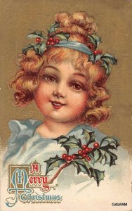 Girl with holly headband gold background # 5835 c1911 Christmas postcard