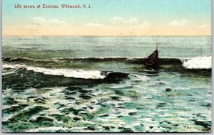 Life Savers At Exercise Wildwood New Jersey NJ Small Boat In The Ocean Postcard