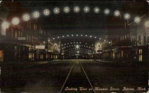 Adrian MI Maumee St. at Night c1910 Postcard rpx