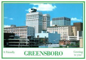 VINTAGE CONTINENTAL SIZE POSTCARD DOWNTOWN VIEW GREENSBORO NORTH CAROLINA