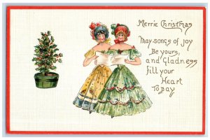 c1910's Christmas Pretty Girls Caroling Holly Berries Embossed Antique Postcard