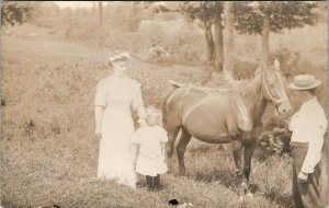 RPPC Introducing Horse to Mother and Daughter Who Doesn't look Happy Postcard W7