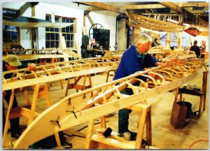 VINTAGE CONTINENTAL SIZE POSTCARD TRADITIONAL BOAT BUILDING AT GRAND MARAIS MN