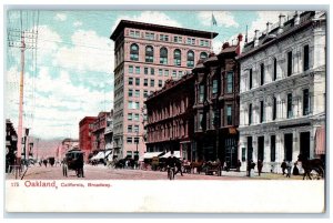 c1920's Broadway Building Horse Carriage Bicycle Dirt Road Oakland CA Postcard