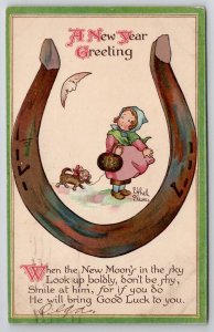 Ethel Dewees New Year Girl Puppy Moon Horseshoe Galveston TX Family Postcard A46
