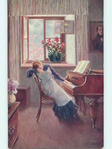 Unused Divided-Back foreign signed WOMAN PLAYING A GRAND PIANO r1619