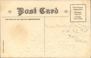 Christmas Dog Puppy Playing Holly Embossed c1900s-20s Postcard