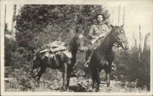 Man on Horse Saddles Packs Gun Rifle c1910 Real Photo Postcard