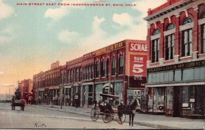 MAIN STREET EAST FROM INDEPENDENCE ENID OKLAHOMA POSTCARD 1909